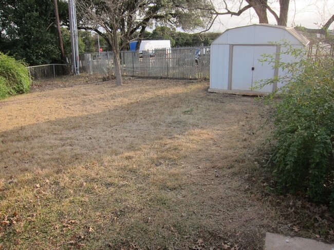 Backyard and storage shed - 327 Briarwood Dr