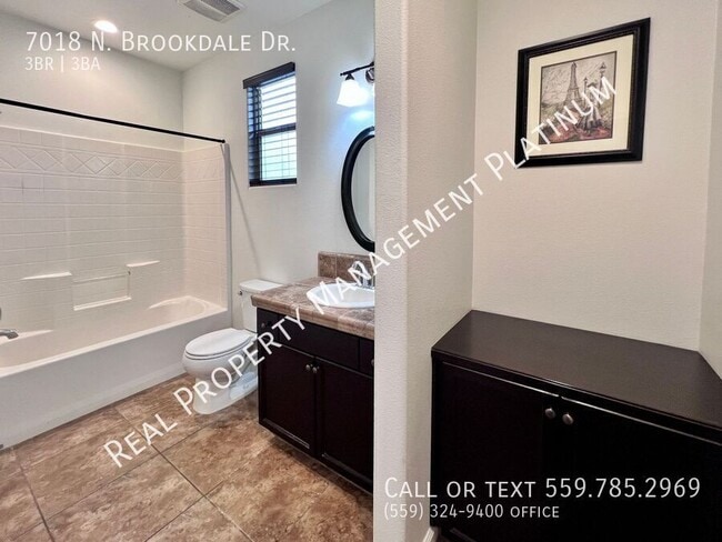 Building Photo - 7018 N Brookdale Dr