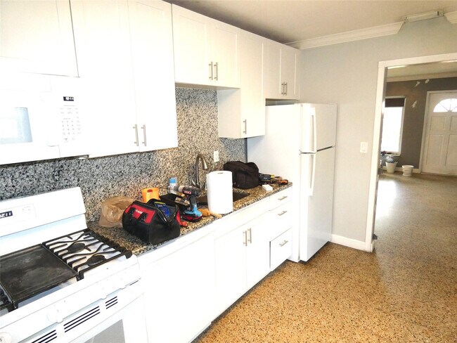 Building Photo - 5448 NE 3rd Ter.