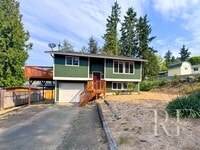 Building Photo - Spacious 4-Bedroom Home with Garage on Qui...
