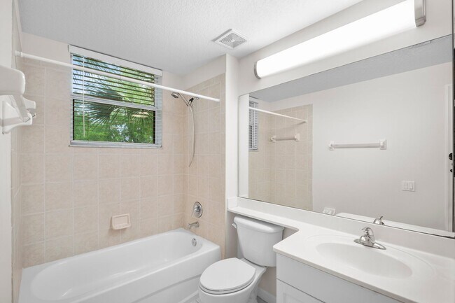 Building Photo - ANNUAL RENTAL - 3 Bedroom, 2 Bath w/ Garag...