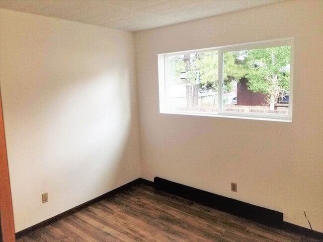 Building Photo - $200 OFF 1st Month! Updated 2 Bed, 1 Bath Townhouse next to NAU!! Students & Sm. Pets OK !! Avail...