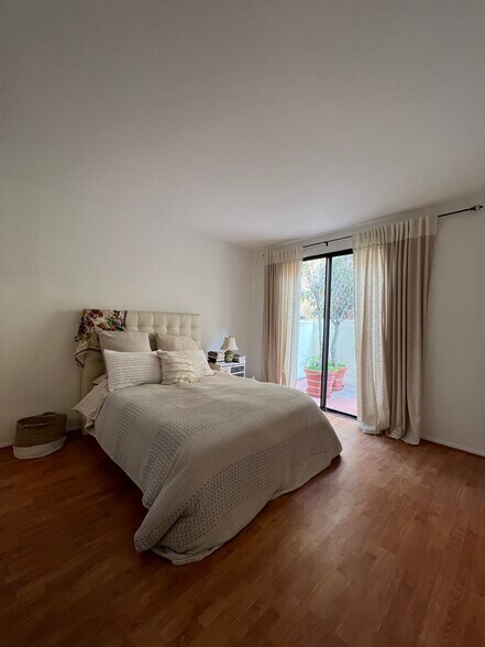 master bedroom with view of patio - 511 N Jackson St