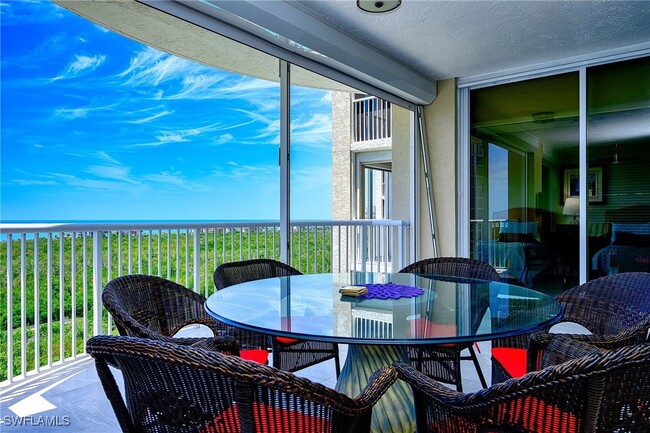Building Photo - 7117 Pelican Bay Blvd