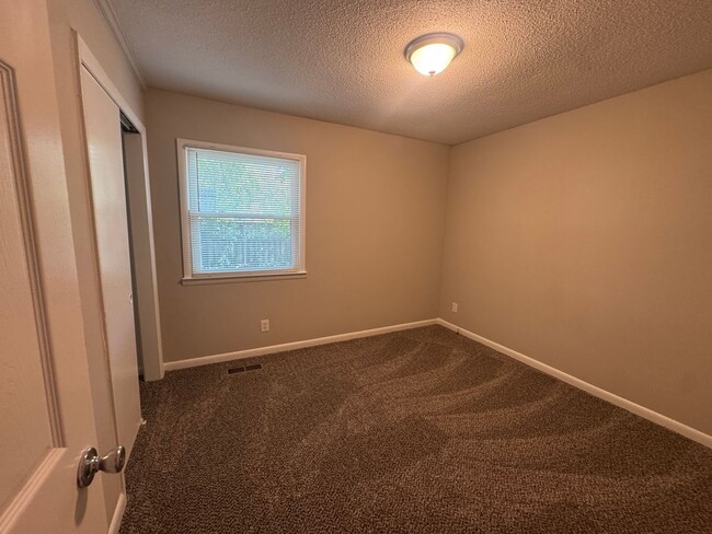Building Photo - Move In Ready! Updated 3 Bedroom Brick House off Guess Road Near Carver St, Durham NC