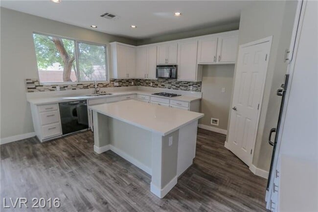 Building Photo - 9029 Blue Raven Ave
