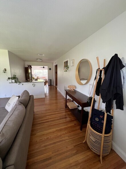 Entryway with open floorplan with view into the backyard. - 30 W Par St