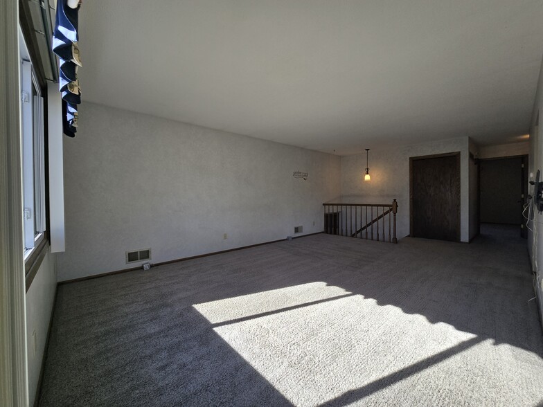 Upstairs living room with plenty of natural light - 775 Madson Ave SW