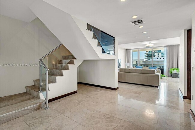 Building Photo - 5875 Collins Ave