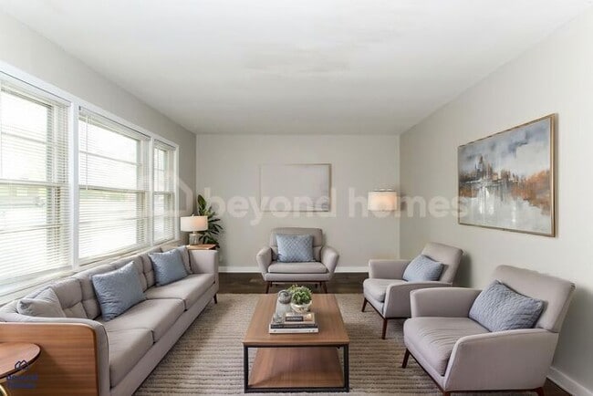 Building Photo - Updated Bungalow with Massive Deck and Fully Fenced Yard!