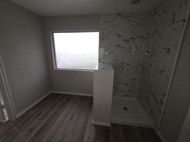 Building Photo - Spacious 4-Bedroom Home with Pool & Spa in...