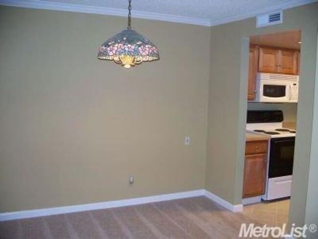 Building Photo - Lower-Level Condo in Gated Timberlake, The...