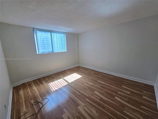 Building Photo - 19380 Collins Ave