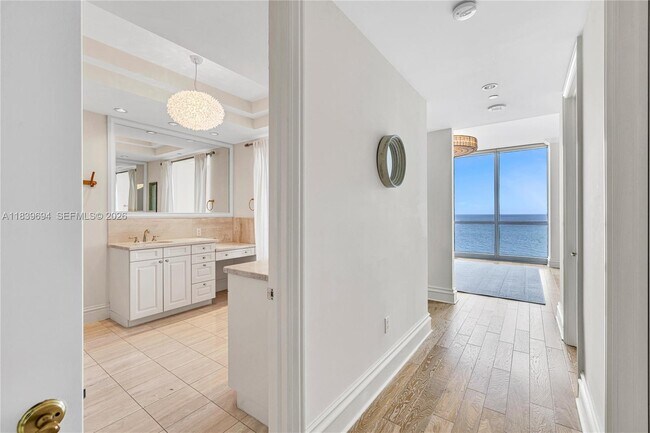 Building Photo - 10295 Collins Ave