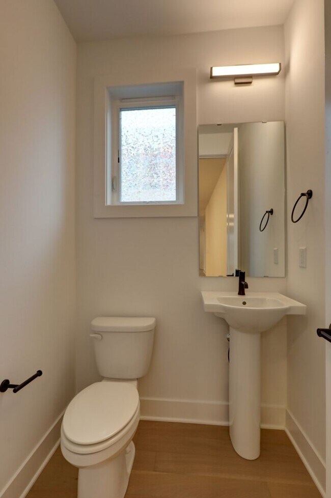 Building Photo - Live Where Style Meets Convenience – 2BR Townhome + Garage