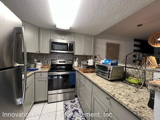 Building Photo - 2 br, 1 bath Apartment - 2 Bedroom 1 Bath ...