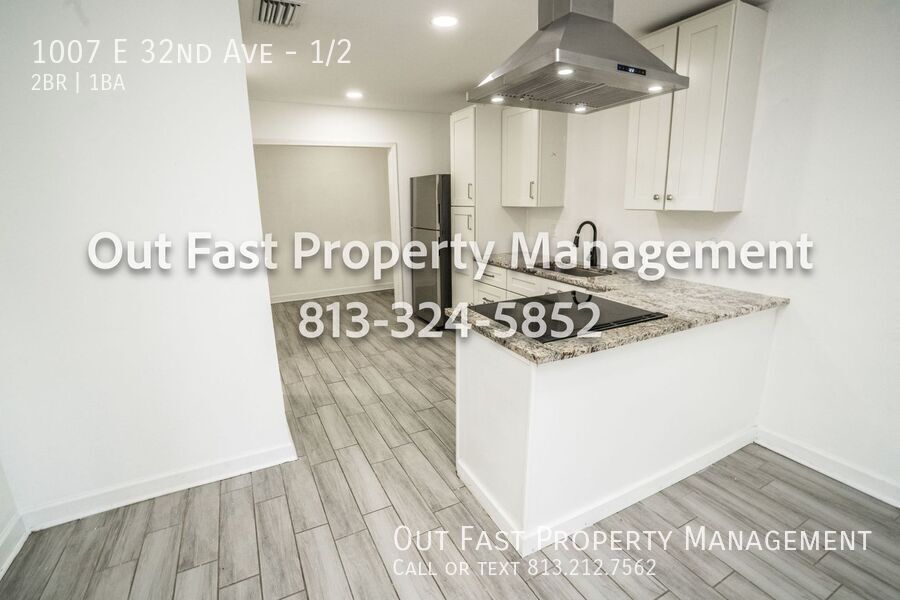 Building Photo - 1007 E 32nd Ave