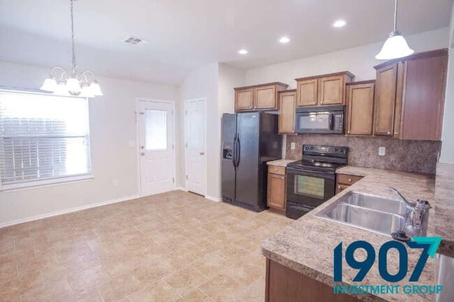 Building Photo - Sacious 4-Bedroom Home with Open Layout!