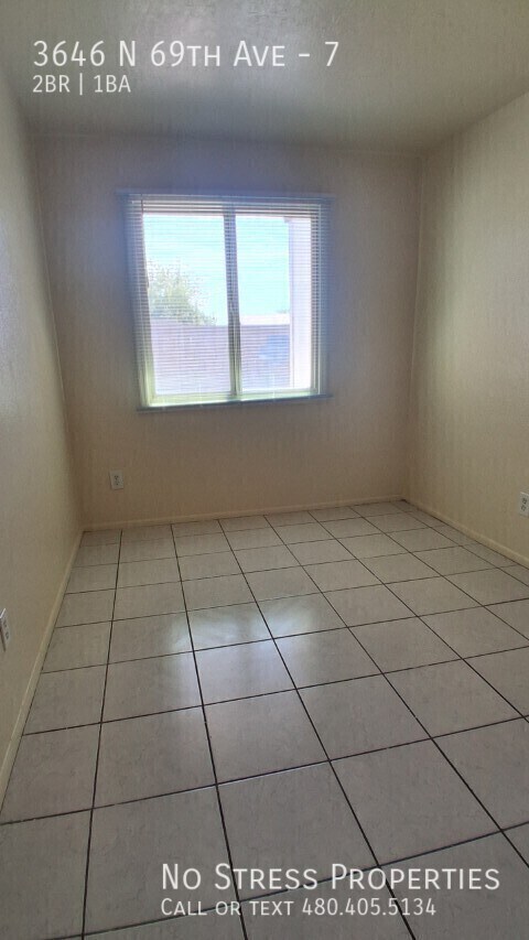 Building Photo - 3646 N 69th Ave
