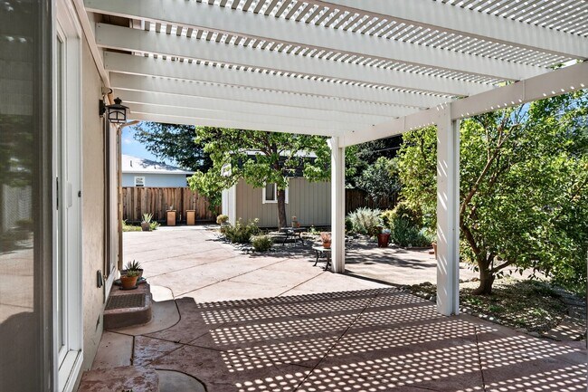 Building Photo - 2,003 Sq Ft Modern 4BR/2BA: Solar, EV Charging & Private Orchard!