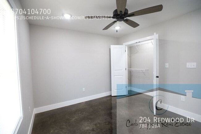 Building Photo - 204 Redwood Dr