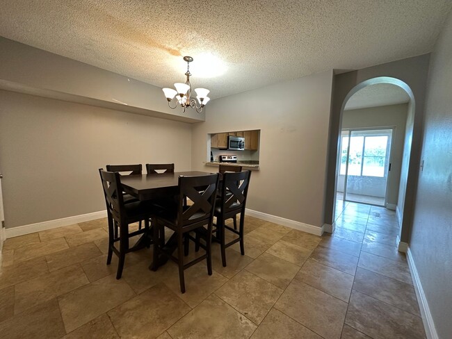 Building Photo - Beautiful Townhome in a gated community wi...