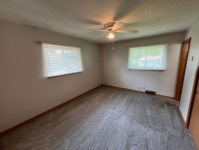 Building Photo - Corner Lot Beauty with Basement & Big Back...