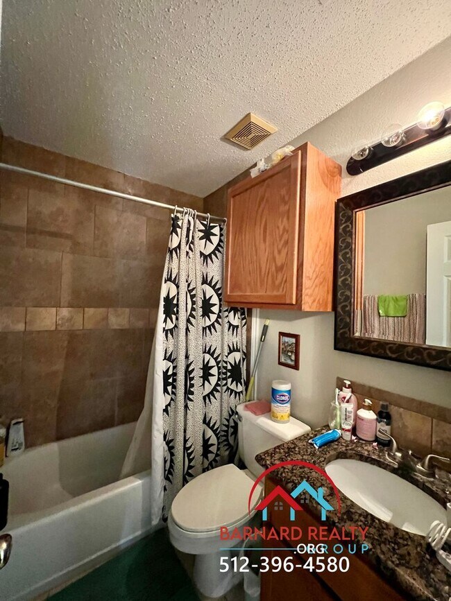 Building Photo - Available July 18: 3 bedroom, 2.5 Bath Duplex with Garage and Fenced Yard