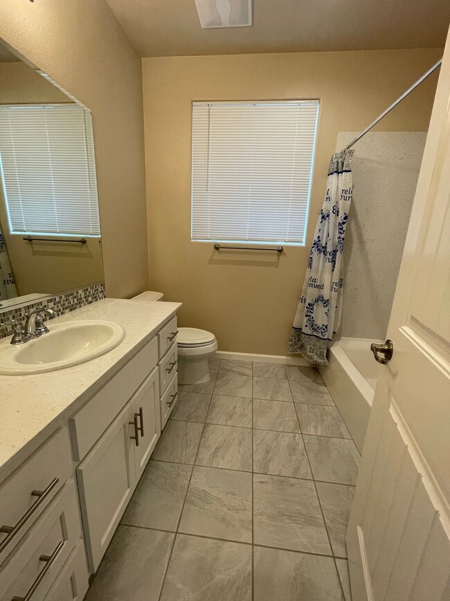 Building Photo - Four Bedroom, Two and a Half Bath Home