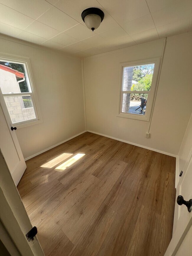 Building Photo - CHARMING! Remodeled 2 Bedroom home with storage and yard