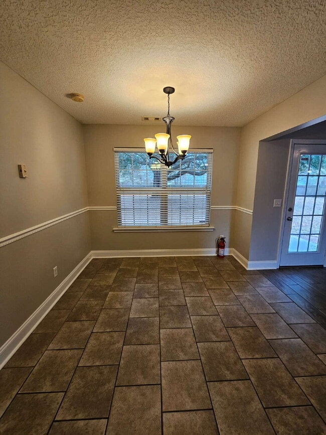 Building Photo - Home in Ludowici for rent with large fenced yard.