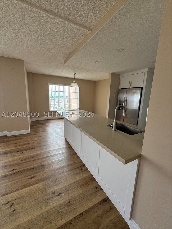 Building Photo - 10777 W Sample Rd