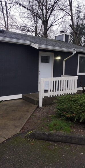 Front door to end unit A, with motion sensor smart Ring lights. - 219 36th E St