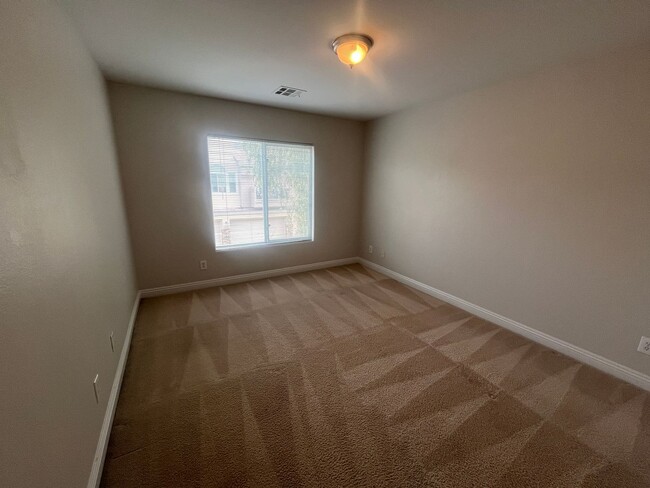 Building Photo - 2 story 2 bedroom - 2 bath - 1 car attached garage - 1182 sq feet -  in gated community.