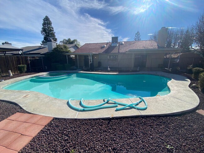 Building Photo - Get ready for Summer in this 3 BD 2 BA SW home with a Pool on a corner lot