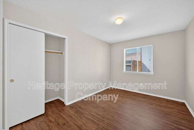 Building Photo - 4935 Dahlia Terrace