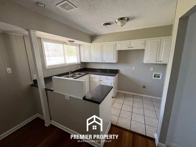 Building Photo - Spacious 3BR Home in 38118 | Hardwood Floors, Formal Dining & Large Fenced Yard