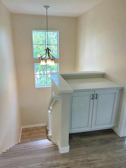 Staircase from Main Floor to Top Floor - 523 W Summerfield Cir