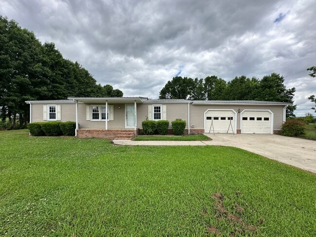 Primary Photo - Inviting 3 Bedroom - 2 Bath Home with Lots...
