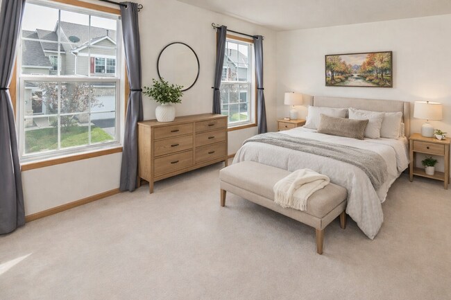 Large second bedroom with plenty of light and closet space. - 1102 Bergmann Dr