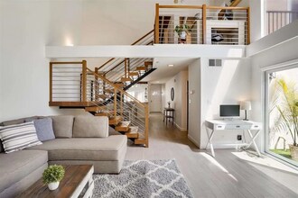 Building Photo - Spacious 1,550 Sq Ft Townhome | 2-Car Garage & High Ceilings w/ Exposed Beams