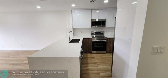Building Photo - 7355 Woodmont Terrace