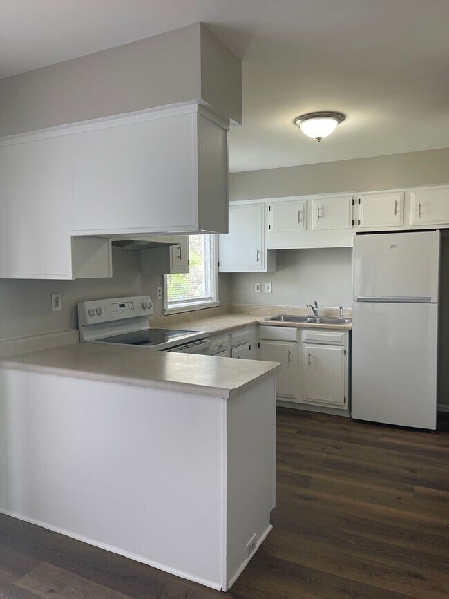 Building Photo - Welcome to this beautifully renovated 2-be...