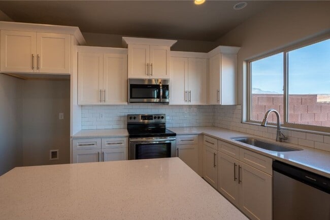 Building Photo - Amazing views! Like New 3 bedroom, 2.5 bath townhome, 2 car garage