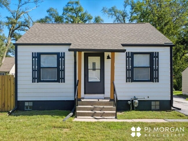 Primary Photo - Stylish Updates + Spacious Yard + 2-Car Ga...