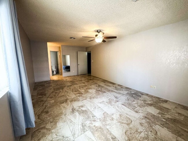Building Photo - "Charming 3-Bed Oasis with 2 Baths and 170...