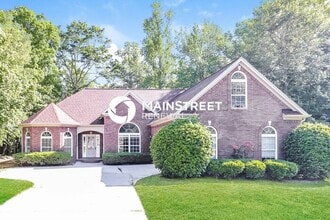 Building Photo - 5 Bedroom Pet-Friendly Home in JONESBORO, GA with Main Street Renewal