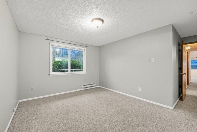 Building Photo - Charming Tacoma Home with A/C, RV Parking, Workshop & Skylit Living Room