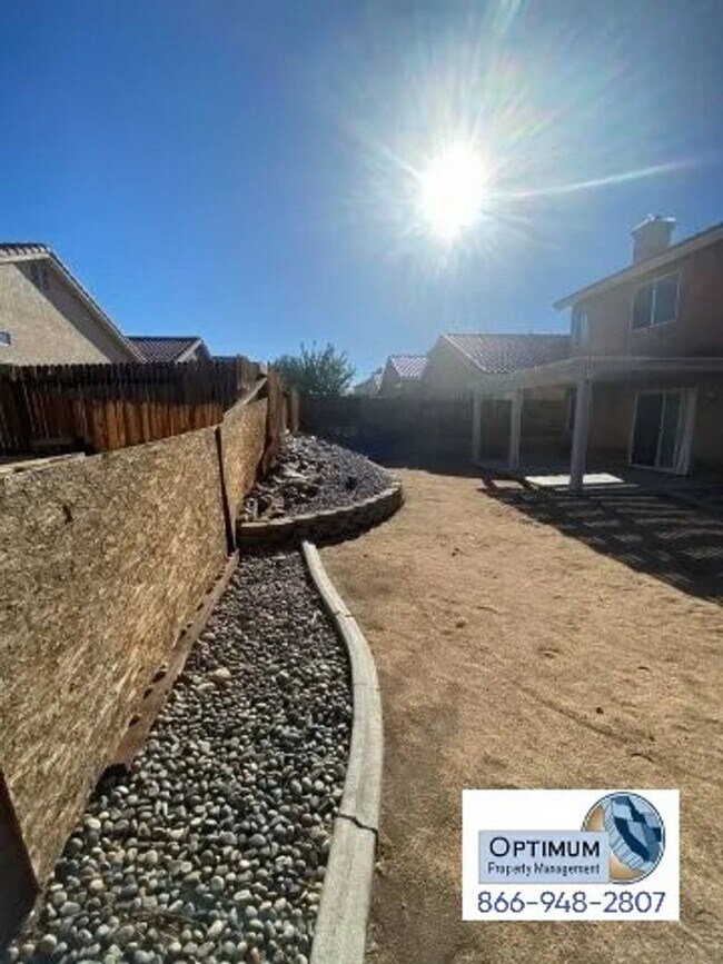 Building Photo - Spacious 4-Bedroom Home with 3-Car Garage & Downstairs Suite!