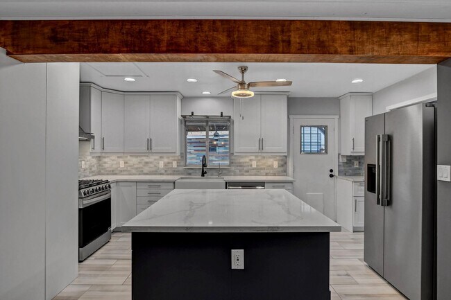 Building Photo - UNIQUE SINGLE FAMILY HOME! - No HOA, Car Lift, RV Parking and Nice Backyard